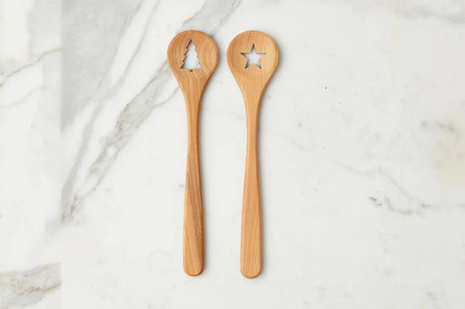 etúHOME | Euro Holiday Spoon Set, Beechwood: Two long-handled wooden spoons with festive star and tree cutouts, perfect for holiday cooking and gifting from Athens Cooks.