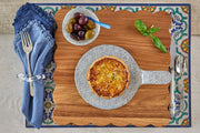 Etú HOME | Positano B Italian Rectangle Vinyl Placemat displayed on a cutting board, showcasing its Italian-inspired design and functionality for kitchen use.