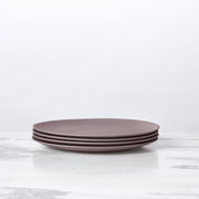 Fable New York Bamboo Salad Plates (Set of 4) - Castle, stacked on a marble surface; durable, eco-friendly, ideal for salads or desserts.