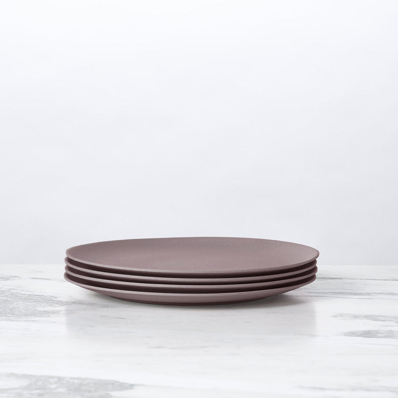 Fable New York Bamboo Salad Plates (Set of 4) - Castle, stacked on a marble surface; durable, eco-friendly, ideal for salads or desserts.