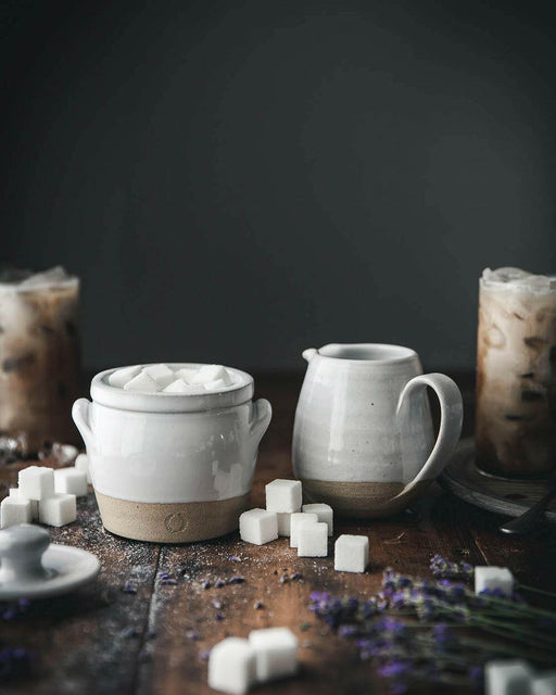 Farmhouse Pottery Sugar Jar and Creamer Set, durable American stoneware, adds charm and functionality for coffee or tea lovers.