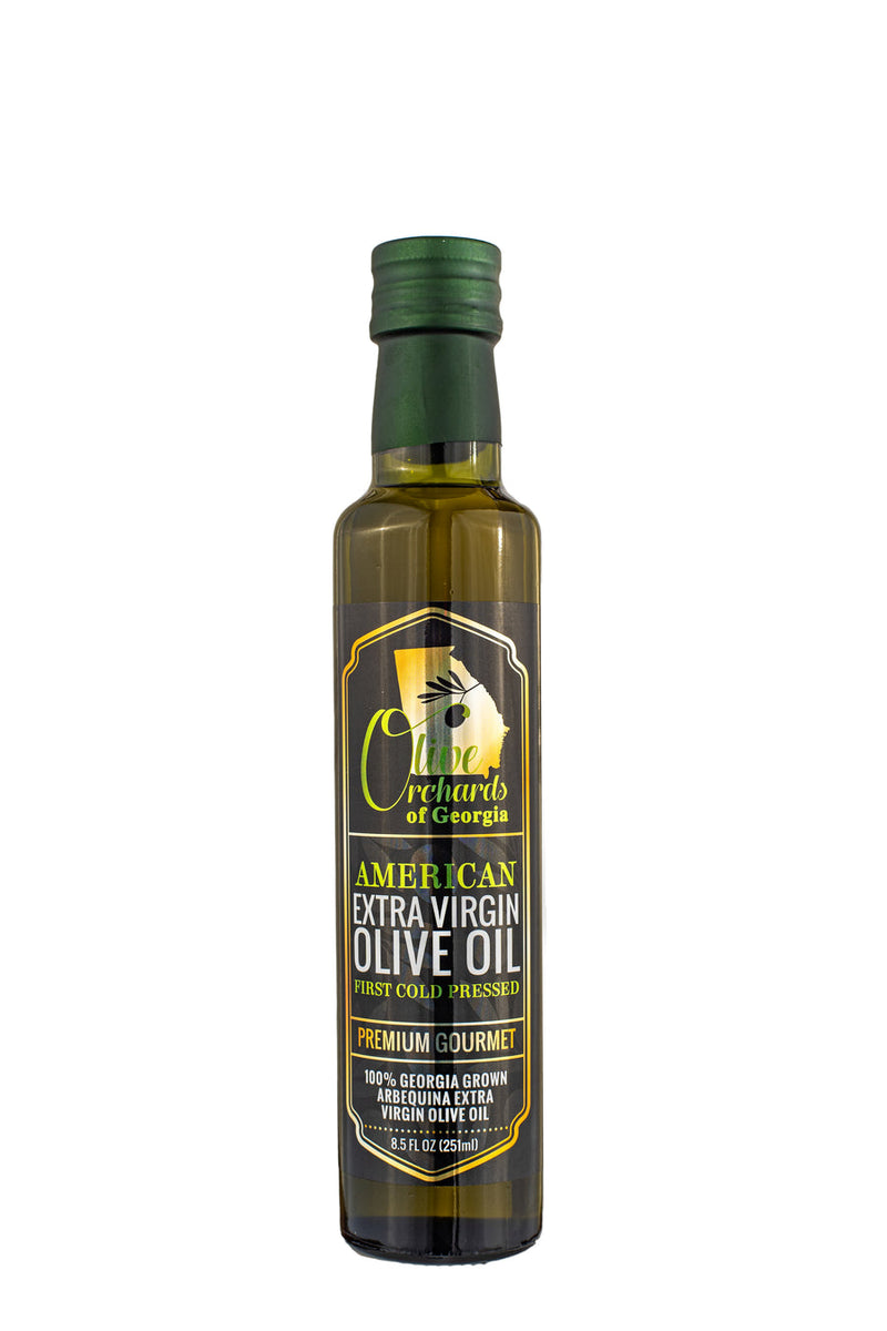 Olive Orchards of Georgia Extra Virgin Olive Oil bottle, known for its light, fruity flavor, ideal for cooking and baking, available at Athens Cooks kitchen store.