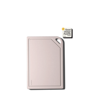 Minimalist MK Free Board™️, Shell, with textured surface and chamfered corner. Features oval handle cut-out, embossed “materia,” and “2023 Good Design Awards Winner” badge.