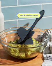 GIR Quad Chopper in a bowl of guacamole, showcasing its efficient food processing capability for smooth and fine consistency in kitchen tasks.