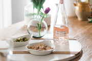 Etú HOME | Clear Sphere Bud Vase elegantly showcases a single-stem flower, adding artisanal flair to your tabletop, perfect for Athens Cooks' curated kitchen and dining settings.