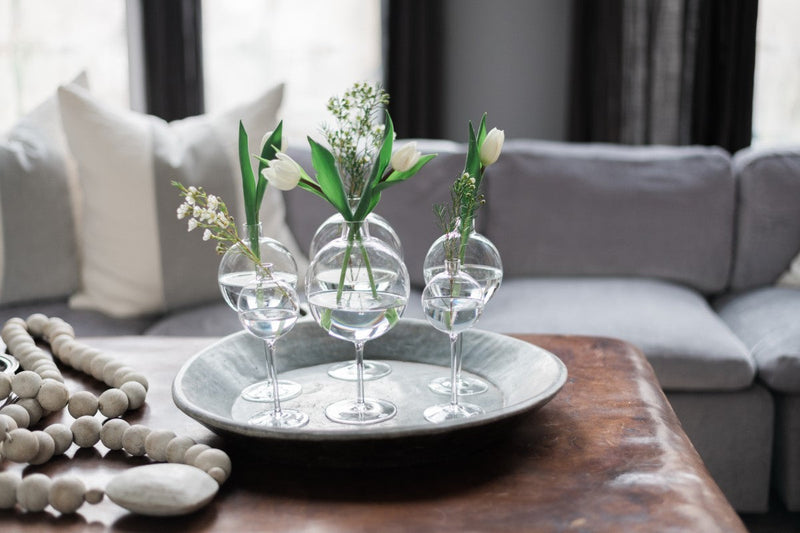 Etú Home | Clear Wine Glass Vase Medium, featuring a unique glass sphere atop a wine glass stem, ideal for elegant table centerpieces or special occasions.