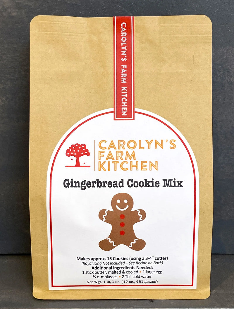 Carolyn's Farm Kitchen Gingerbread Mix in a kraft pouch, featuring a gingerbread-man label, recipe yields, ingredient list, and net weight details, perfect for festive baking.
