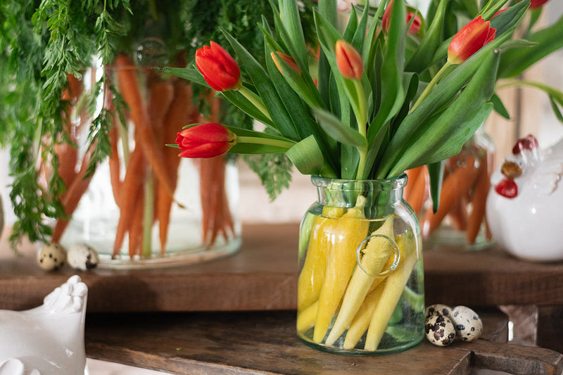 French Bee Mason Jar Small used as a vase, filled with fresh flowers, inspired by European jars, highlighting its elegant, imperfect shape and vintage French bee seal.
