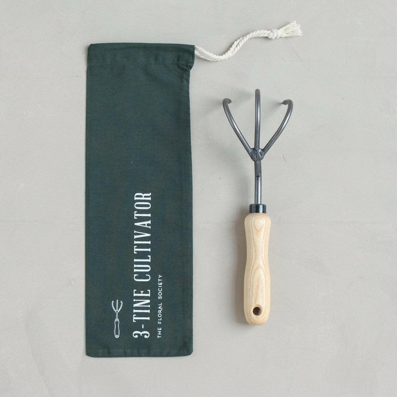 The Floral Society | Garden Tools - Japanese Hori Hori, featuring a serrated and smooth stainless steel blade, ideal for precise gardening tasks, handcrafted in Japan.