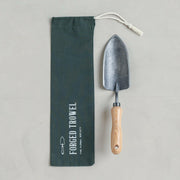 Japanese Hori Hori from The Floral Society, featuring a serrated and smooth stainless steel blade, ideal for precise gardening tasks. Handcrafted in Japan, perfect for indoor and outdoor use.