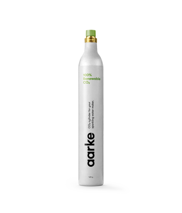 Aarke CO2 Cylinder with a white body and green top, designed for carbonating drinks, ideal for use in kitchen and bar settings.