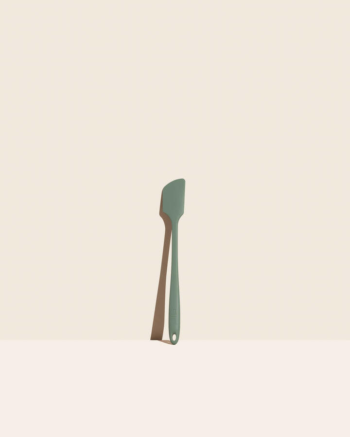 GIR | Skinny Spatula - Navy, featuring a sleek design and antimicrobial construction, ideal for versatile kitchen use.