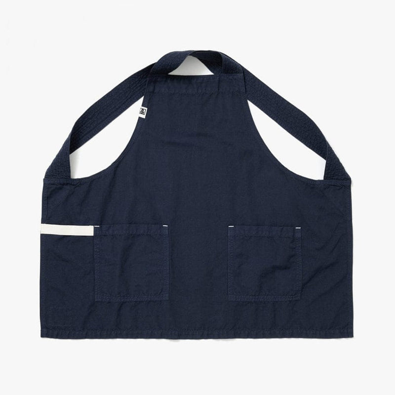 Hedley & Bennett | Smock - Blueberry: Dark navy apron with neck loop, waist ties, two front pockets, and a contrasting white band, perfect for kitchen tasks.