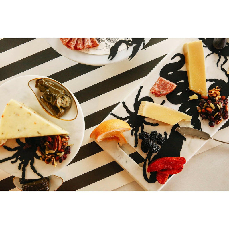 Spiderweb Table Runner from Hester & Cook's Halloween Collection adds spooky charm to your decor, ideal for enhancing festive Halloween gatherings.