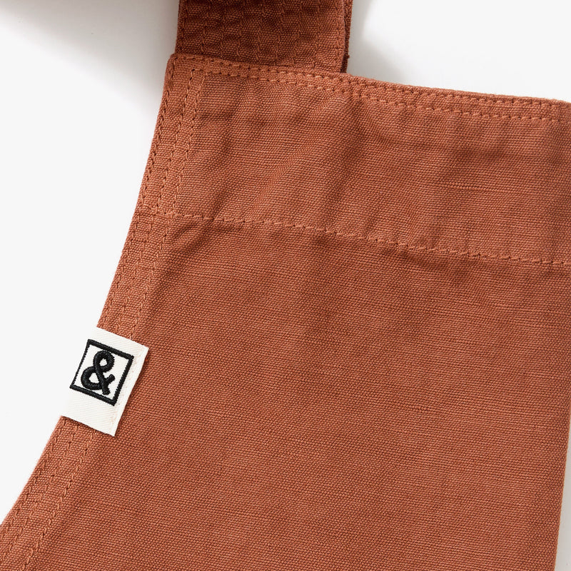 Hedley & Bennett Smock Apron, Harissa Red — fabric and fit detail