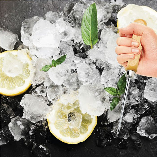 Hand using the Harold Import Company Ice Pick with Safety Cover to chip ice, showcasing its functionality and safe design amidst a kitchen setting with lemons.