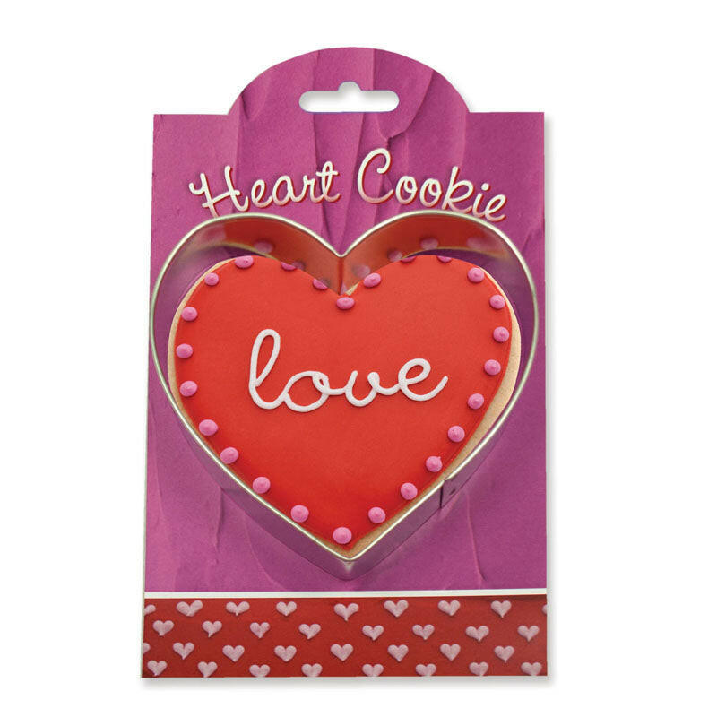 Ann Clark heart-shaped cookie and cake with red frosting, showcasing premium baking supplies from America's largest cookie cutter manufacturer.