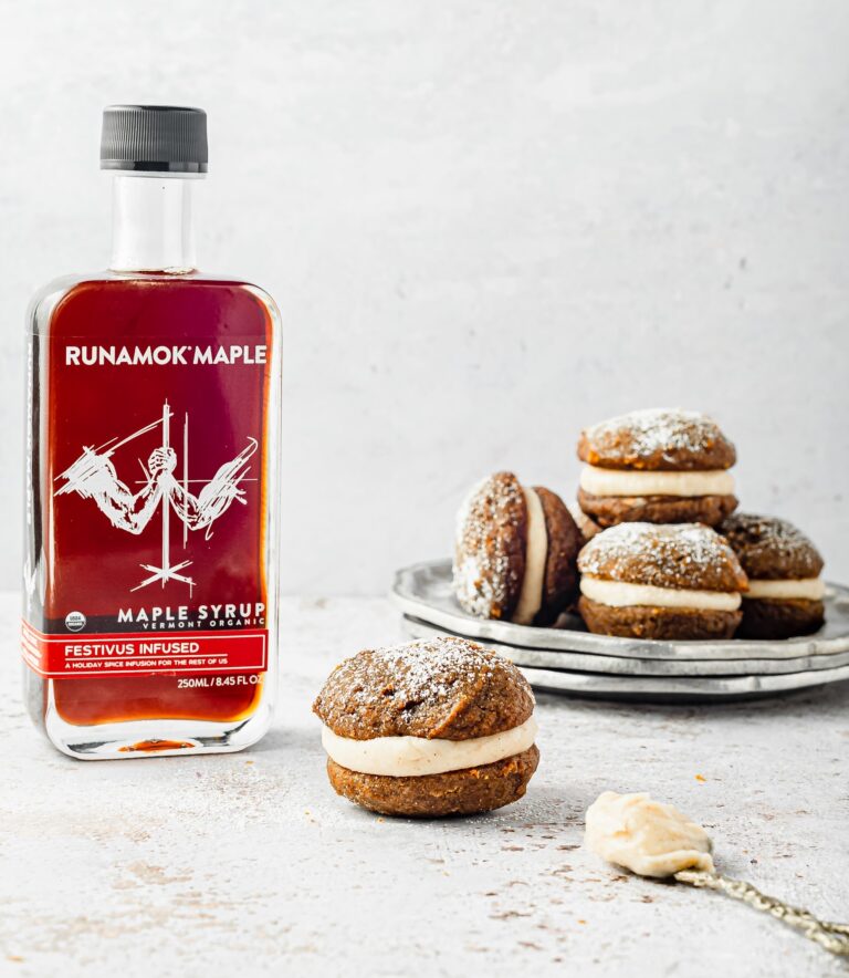 Close-up of Runamok | Maple Syrups - Festivus Spice Infused, highlighting its unique blend perfect for enhancing waffles, pancakes, or desserts with festive flavors.