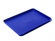 Great Jones | Holy Sheet - Pepper, a blue nonstick ceramic half-sized sheet pan, ideal for effortless baking and serving, showcased against a contrasting background.
