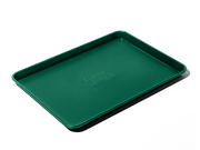 Great Jones | Holy Sheet - Pepper, a versatile half-sized sheet pan with nonstick ceramic coating, perfect for easy cleaning and oven-to-table presentation.