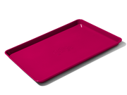 Great Jones | Holy Sheet - Pepper: A versatile half-sized sheet pan with nonstick ceramic coating for easy cleanup, ideal for both baking and serving.