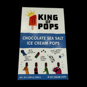 King of Pops | Chocolate Sea Salt - 4 pack box with colorful design, featuring blue sun illustration and product details, highlighting handcrafted Colombian chocolate popsicles.