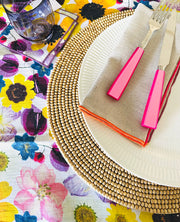 Tisch New York | Floral Napkins Set of 4 displayed on a plate with a fork and knife, ideal for elegant dining settings.