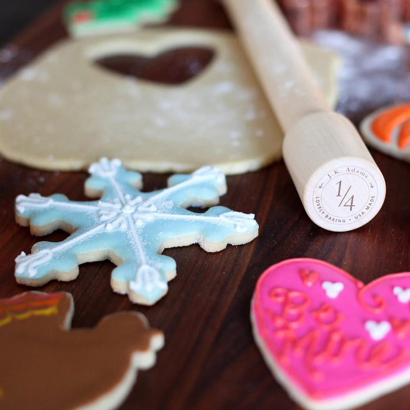 J.K. Adams | Lovely Rolling Pin, 24 Inches, amid festive cookies and dough in a baking scene, showcasing precision for perfect pastry thickness.