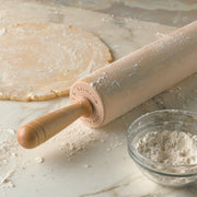 J.K. Adams | Patisserie Rolling Pin on a floured countertop, showcasing precise craftsmanship ideal for passionate bakers, part of Athens Cooks' curated kitchen tools.