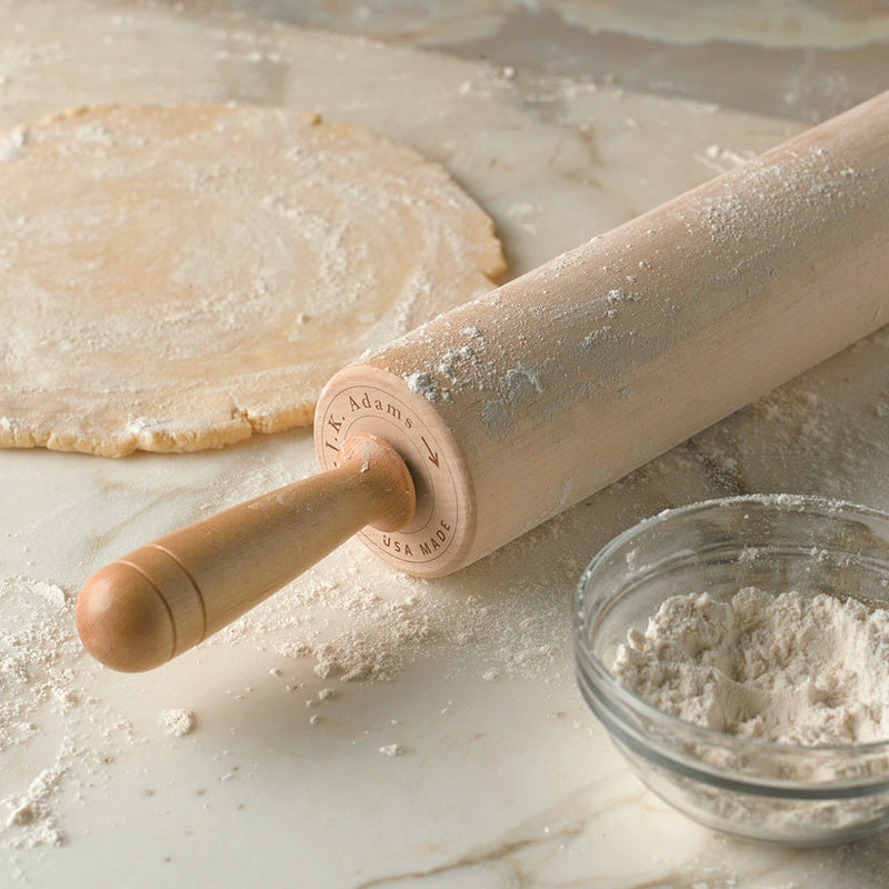 J.K. Adams | Patisserie Rolling Pin on a floured countertop, showcasing precise craftsmanship ideal for passionate bakers, part of Athens Cooks' curated kitchen tools.