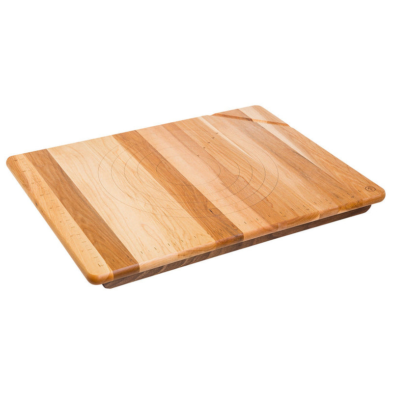 J.K. Adams | The Ultimate Pastry Board features concentric circle guides and a ruler, designed for precise baking, made from solid wood with a recessed base.