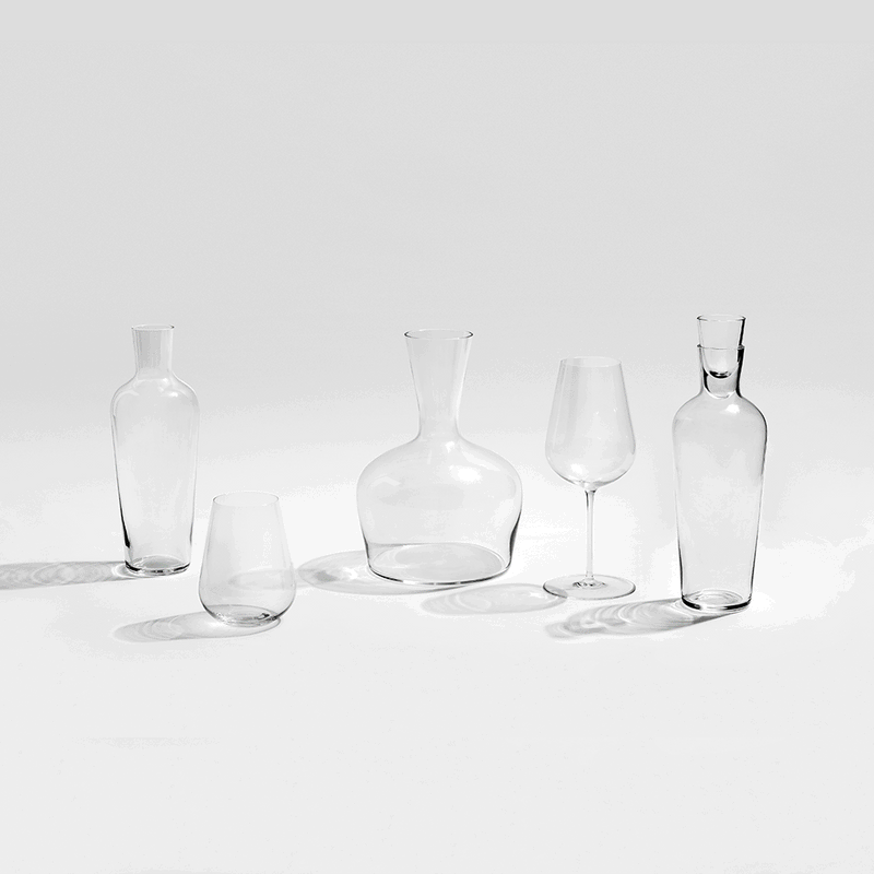 Richard Brendon | Jancis Robinson Original Wine Glass Set of 2, featuring tulip-shaped bowls, designed for optimal wine enjoyment, showcased among a collection of elegant glassware.