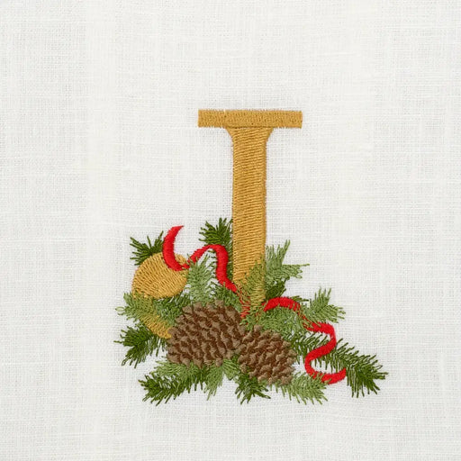 Winter Pine Monogram Towel from Arte Italica & Crown Linen Designs features gold-thread I and festive pine sprig motif, ideal for elegant kitchen decor.