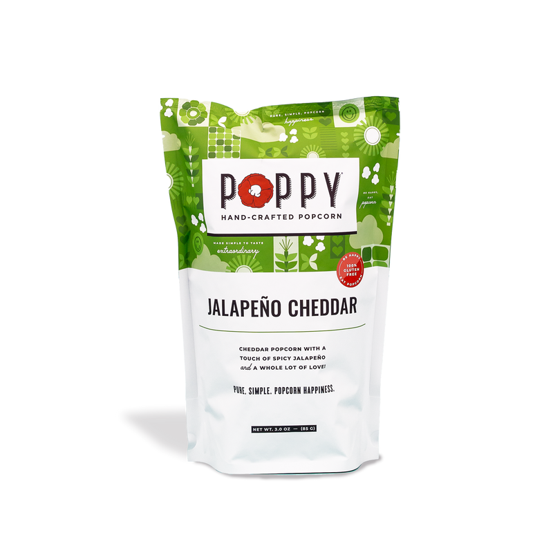 Poppy | Handcrafted Popcorns - Jalapeño Cheddar in a bag with a green and white label, featuring a spicy, cheesy flavor.