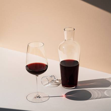 Richard Brendon | Jancis Robinson Mature Wine Decanter with a glass of red wine, showcasing elegant design and functionality for wine enthusiasts.