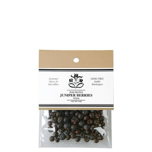 India Tree Juniper Berries - 1 oz: Close-up of label and a bag with hand-harvested berries, known for their aromatic flavor, perfect for enhancing culinary dishes.