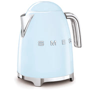 SMEG electric kettle in pastel blue with a retro design, featuring a chrome-plated spout and handle, on a stainless steel base.