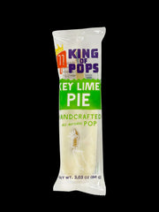 King of Pops | Key Lime Pie popsicle in a plastic bag, showcasing its creamy texture and gingersnap crust, inspired by a piece of pie on a stick.