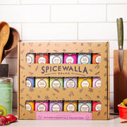 Spicewalla Kitchen Essentials Collection Gift Set, featuring 18 colorful tins of essential spices, perfect for enhancing any kitchen with fresh, bold flavors.