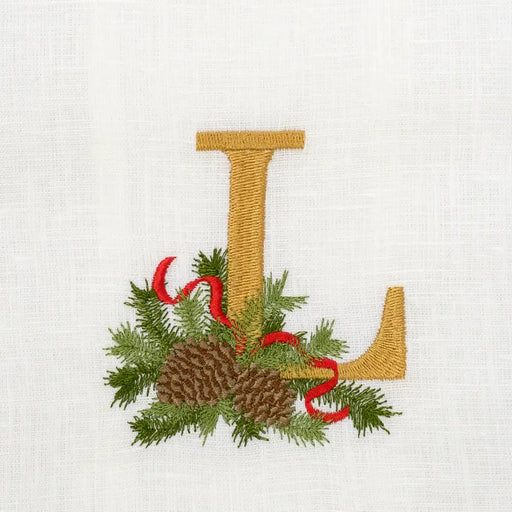Arte Italica & Crown Linen Designs Winter Pine Monogram Towel with embroidered gold “L” and winter sprig motif, enhancing elegance for kitchen or bathroom.