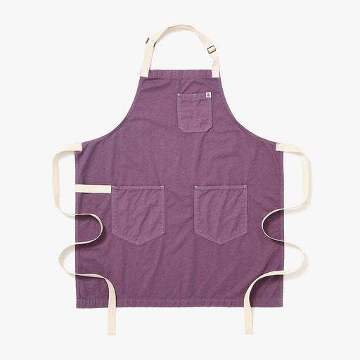 Hedley & Bennett | Essential Garment Dyed - Lavender apron with beige neck strap, waist ties, and three pockets, crafted from sturdy fabric, ideal for culinary enthusiasts.