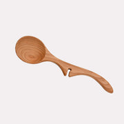 Jonathan's Spoons Lazy Spoon® + Ladle, extra wide 12 inches, crafted from cherry wood for practicality and style, elegantly rests on pots for mess-free serving.