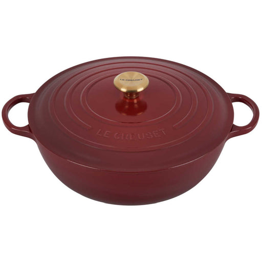Le Creuset | Signature Chef's Ovens: Red enameled cast-iron braiser with lid and side handles, ideal for versatile cooking tasks, emphasizing efficient stirring and heat retention.