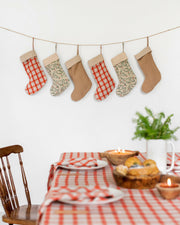 MagicLinen | Linen Christmas Stockings - Clay Red: Handcrafted, sustainable linen stocking with a double layer and hanging loop, perfect for enhancing your holiday decor sustainably.