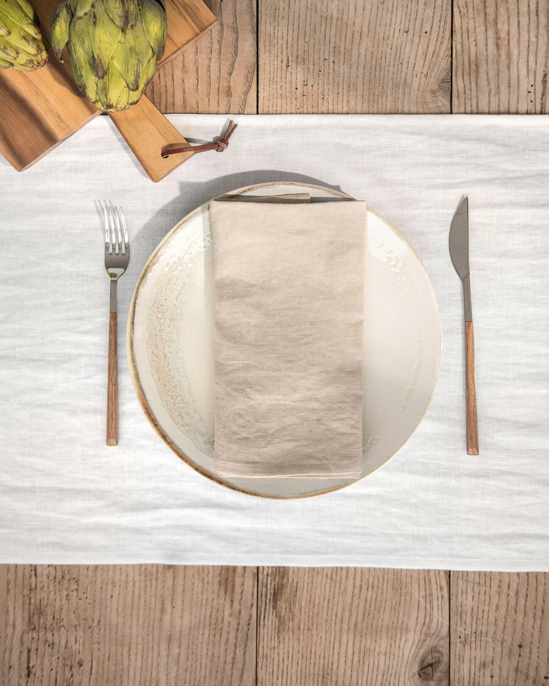 MagicLinen Linen Napkins - Cinnamon Gingham, Set of 2, showcasing elegant, stone-washed fabric perfect for enhancing any dining setup with a soft, durable touch.