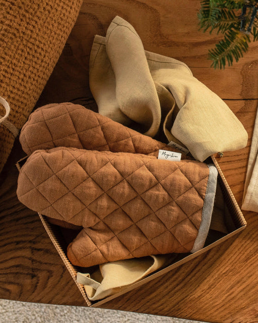 MagicLinen | Linen Oven Mitts - Chocolate Brown, featuring a quilted exterior with heat-insulating padding, ideal for protecting hands during cooking and baking.