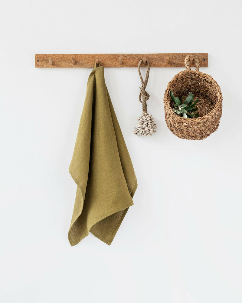 MagicLinen Linen Tea Towels in Forest Green, perfect for stylish and practical kitchen use, featuring a soft, absorbent texture with a handy hanging loop.