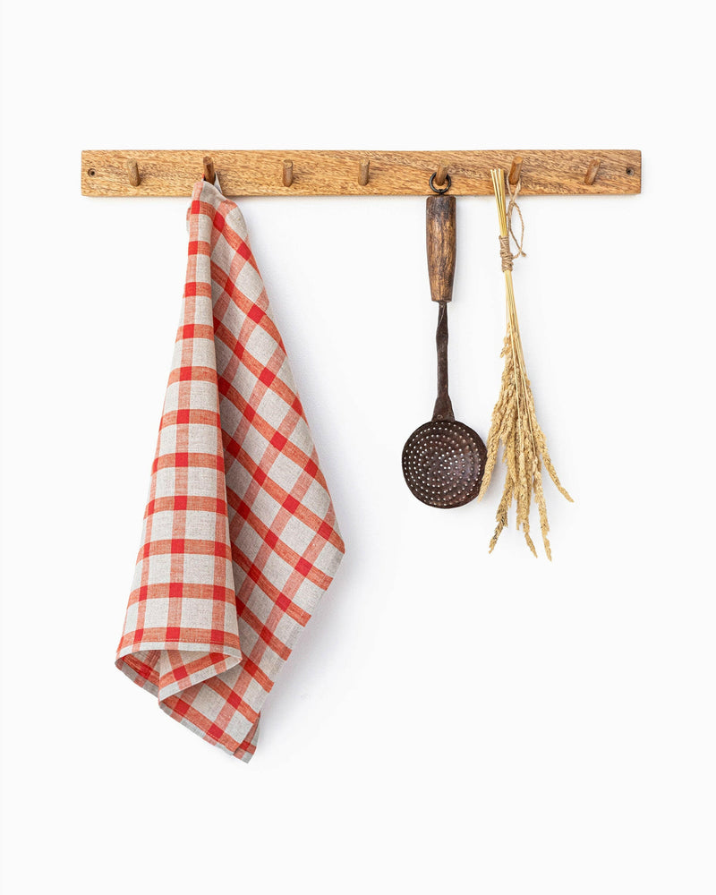 MagicLinen Linen Tea Towels in Forest Green, featuring a handy loop for easy hanging. Perfect for both drying dishes and enhancing kitchen decor.