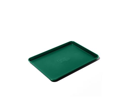 Great Jones | Little Sheet - Pepper: A compact, nonstick quarter-sized baking sheet, ideal for small ovens, perfect for personal cookies or reheating, oven-safe, and dishwasher-friendly.