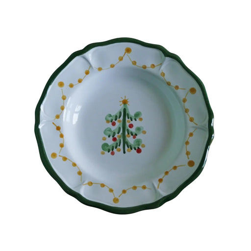 La Gabbianella | MAGIA, Pasta Bowl in green, features a scalloped edge, a decorative Christmas tree center, and a yellow-dot garland rim, handmade in Italy.